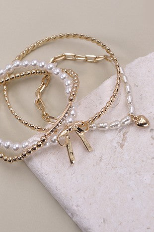 Gold and Pearl Bow Stretch Bracelet Set