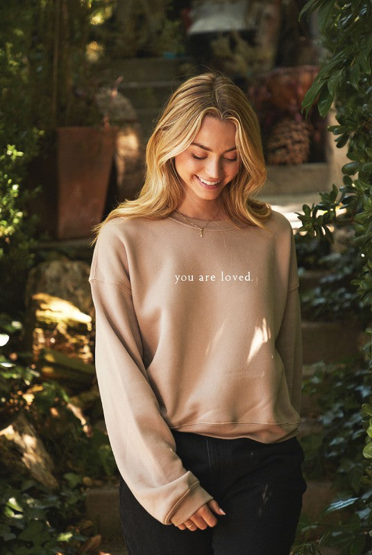 The You Are Loved Tan Cropped Graphic Sweatshirt