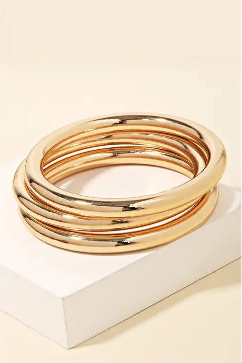 The Set Of Three Gold Bangle Bracelets