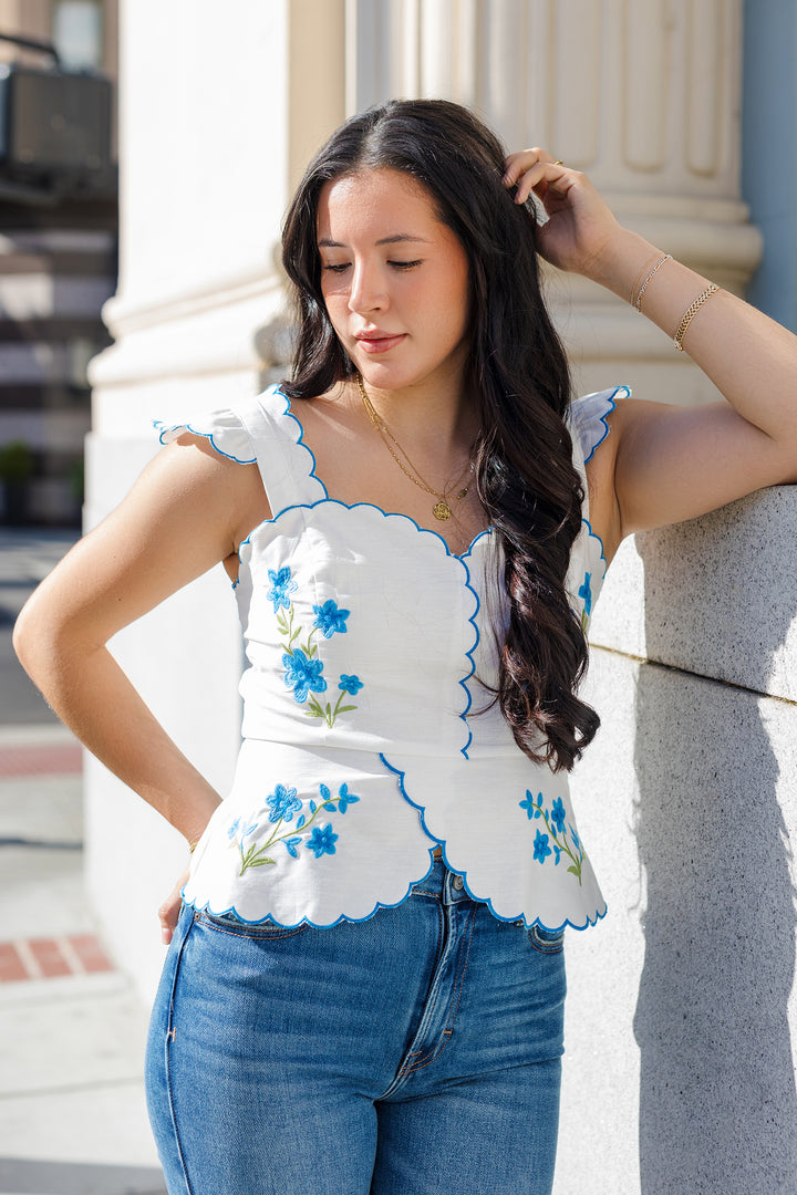 The Full Bloom Embroidered Linen Peplum Top