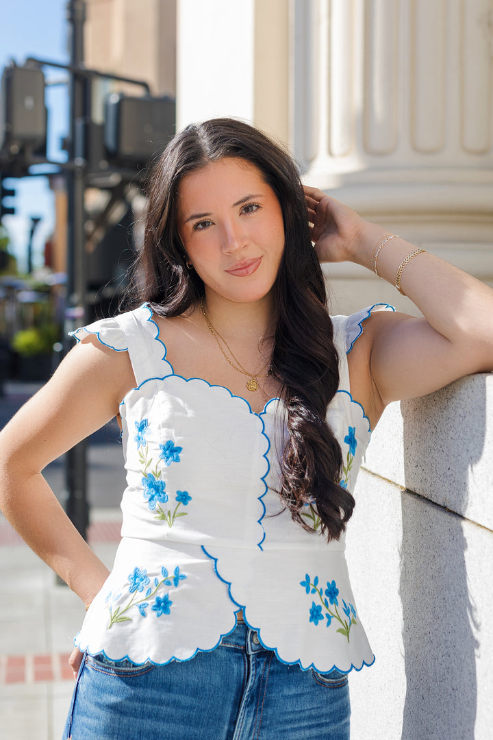 The Full Bloom Embroidered Linen Peplum Top