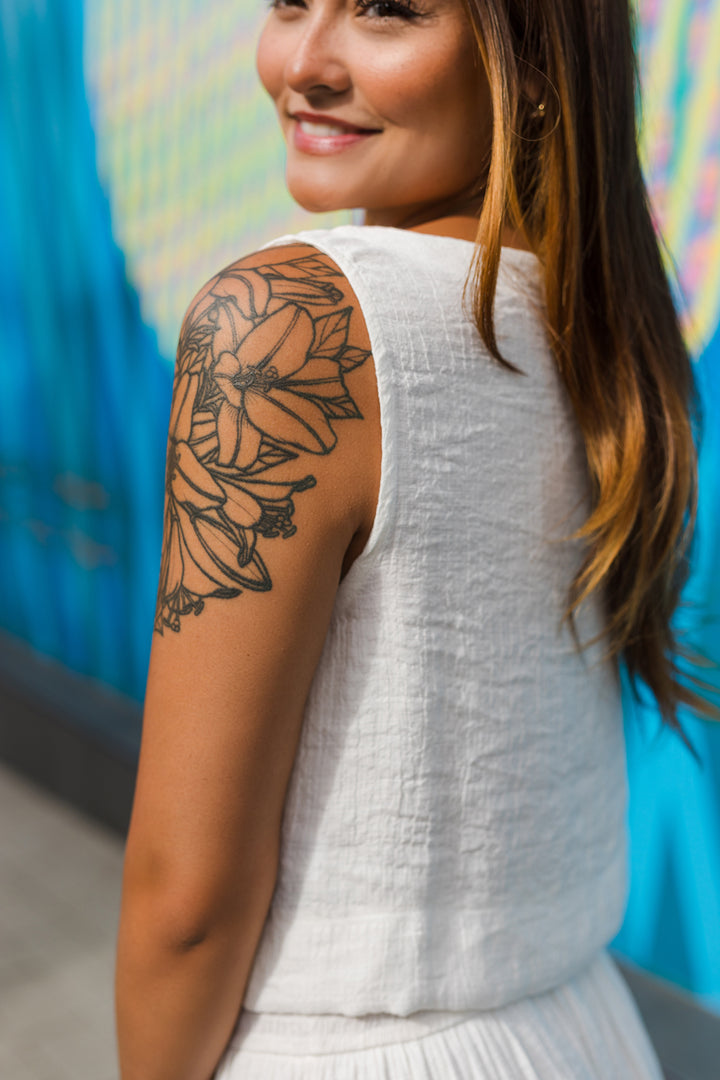 The Weekend Recap Button Front Sleeveless Top