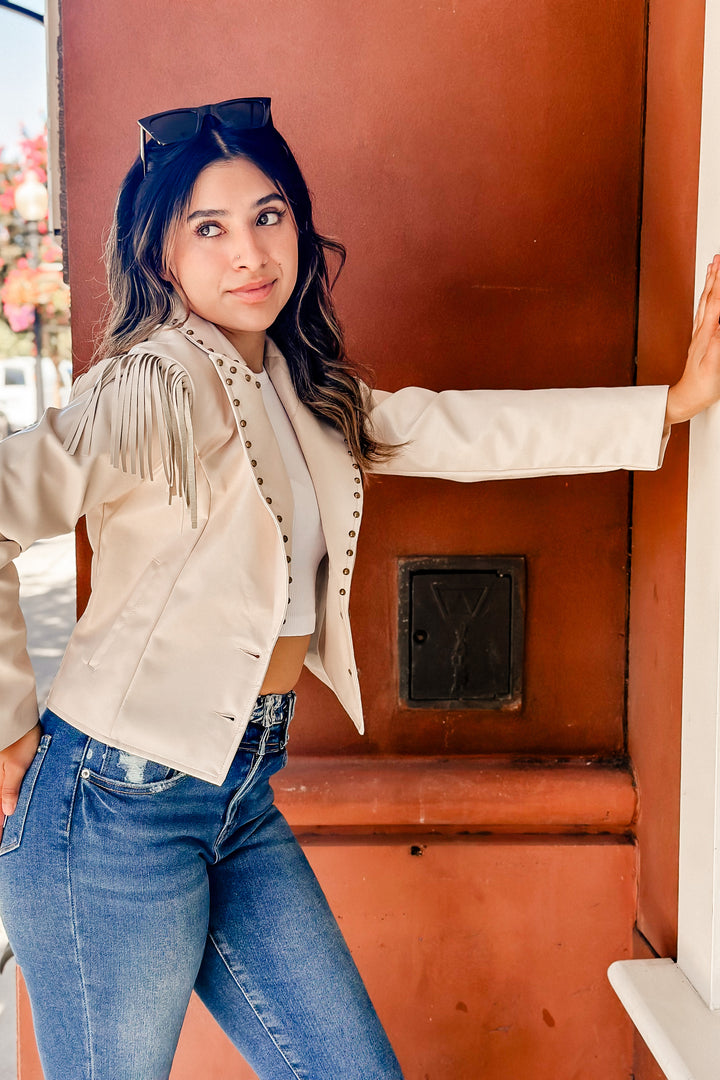 The Royce Cream Faux Leather Fringe & Stud Cropped Jacket