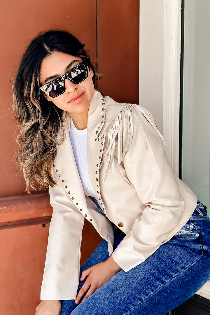 The Royce Cream Faux Leather Fringe & Stud Cropped Jacket