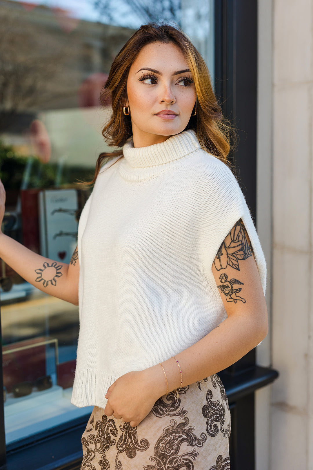 The Jacelyn Cream Roll Neck Sleeveless Sweater