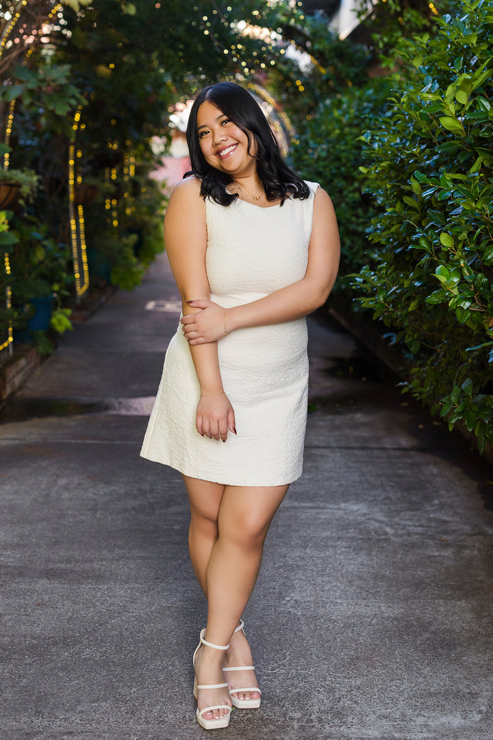 The It's My Party Cream Back Tie Mini Dress