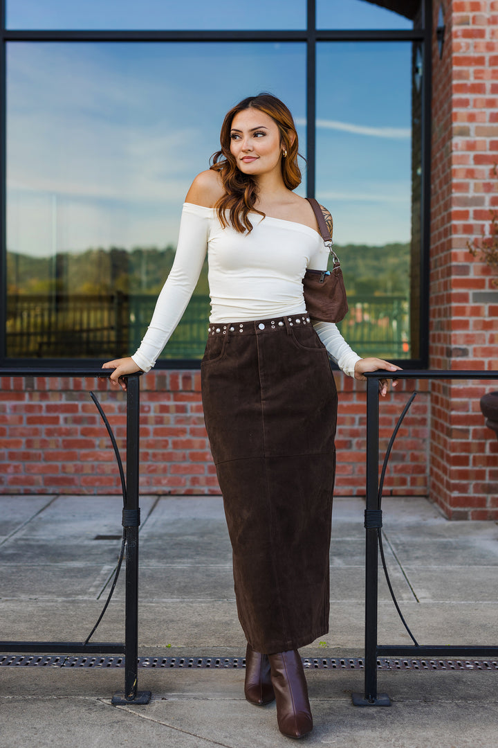 The Tell Me About It Stud Suede Midi Skirt