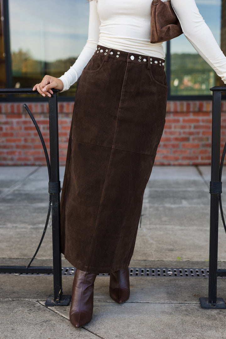 The Tell Me About It Stud Suede Midi Skirt