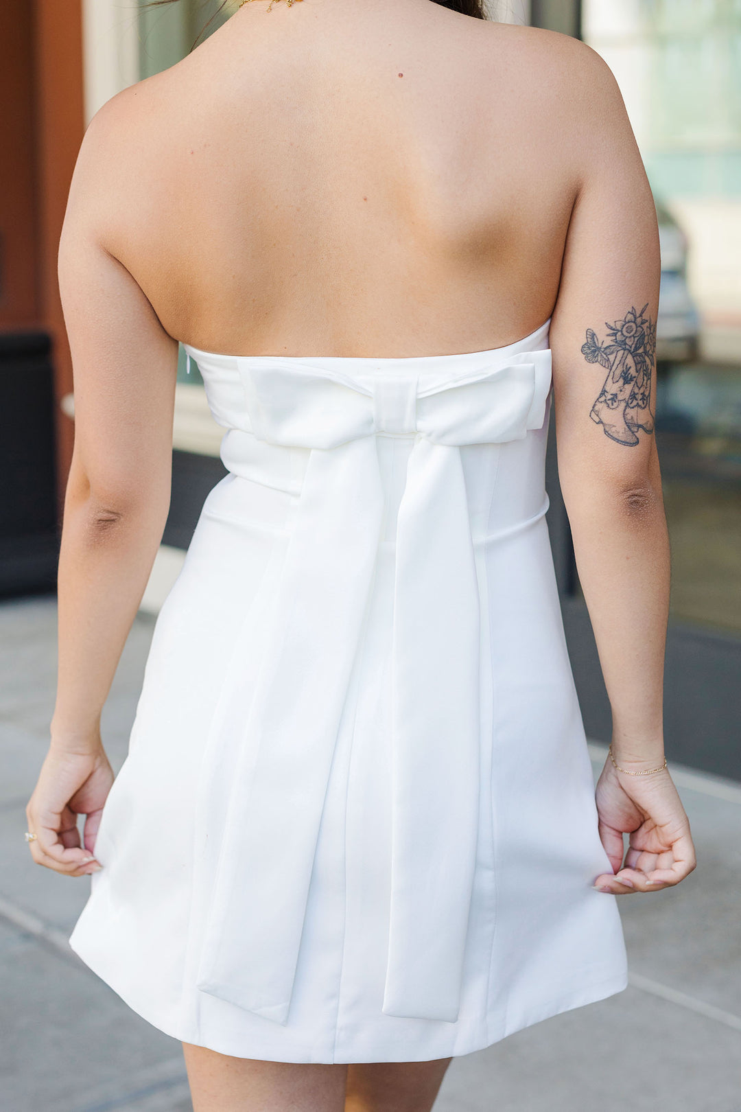 The Almost To The Alter White Bow Back Mini Dress