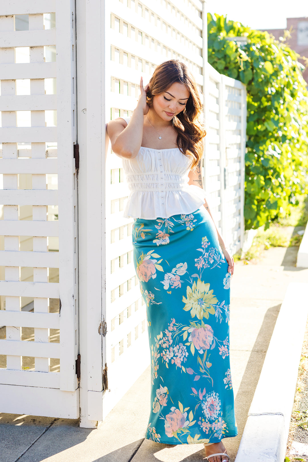 The Soft Launch Sleeveless Peplum Top