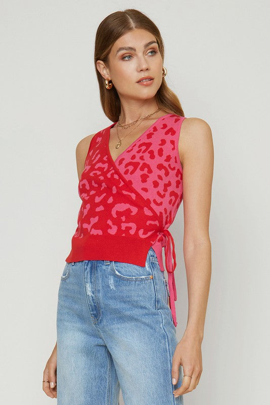 The Heart & Soul Pink & Red Leopard Print Sleeveless Side Tie Sweater