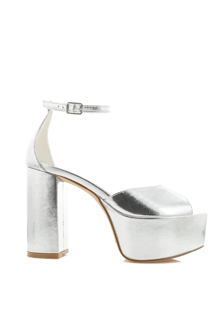 The Romara Silver Metallic Platform Heels by Billini